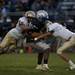 Lincoln senior wide receiver Tyree Waller is tackled by Chelsea defenders on Friday. Lincoln lost 41-20. Daniel Brenner I AnnArbor.com